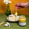 Coconut curd in a clear glass jar.