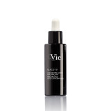 A sleek black bottle of "Glyco 10" resurfacing acid concentrate with a dropper top, featuring the brand name "Vie."