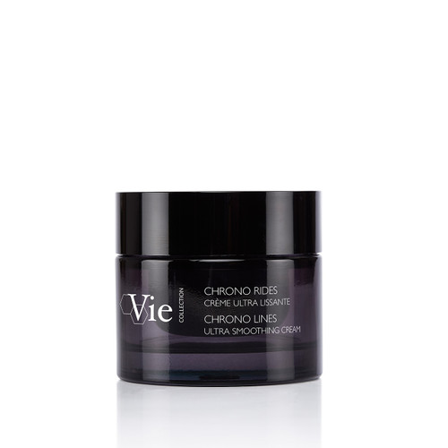 A dark jar of "Chrono Rides Ultra Smoothing Cream" from the Vie Collection, featuring a sleek black lid and elegant labeling. A dark jar of "Chrono Rides Ultra Smoothing Cream" from the Vie Collection, featuring a sleek black lid and elegant labeling.