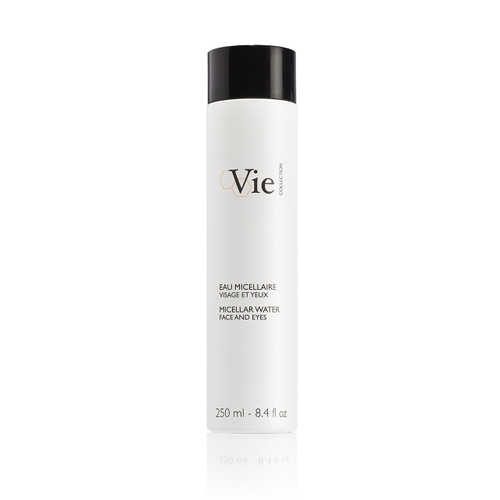 A white bottle of micellar water for face and eyes, labeled "Vie Collection," with a black cap. Contains 250 ml.