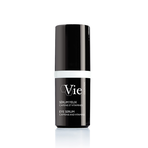 A sleek black bottle of eye serum labeled "Vie" with white accents, featuring caffeine and vitamins. A sleek black bottle of eye serum labeled "Vie" with white accents, featuring caffeine and vitamins.