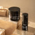 Night Balm Rich Multi-Youth Cream and Hydra Volume Lip Plumping Serum sitting on top of holiday gift boxes.