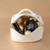 Time Control Deep Wrinkle Firming Rich Cream and the Hydra Volume Lip Plumping Serum laying together in the white pouch.