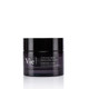 A dark jar of "Chrono Rides Ultra Smoothing Cream" from the Vie Collection, featuring a sleek black lid and elegant labeling.