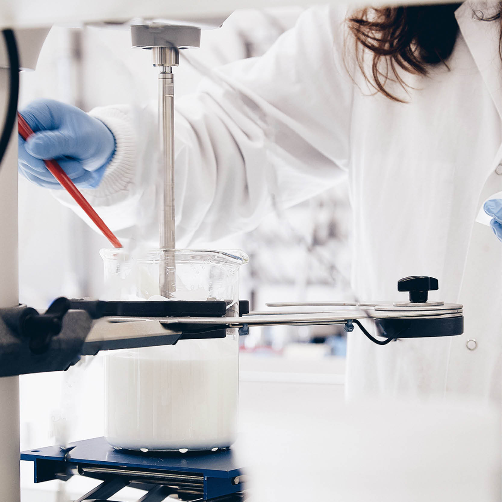 Woman working in a lab with a lab