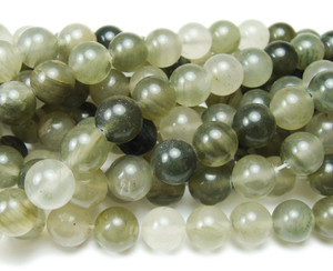 Green rutilated quartz smooth round beads Green rutilated quartz smooth round beads