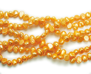 6-8mm 15 Inch Strand Orange Nugget Pearls