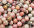 8mm Mongolian Rhodonite Smooth Round Beads 8mm Mongolian Rhodonite Smooth Round Beads