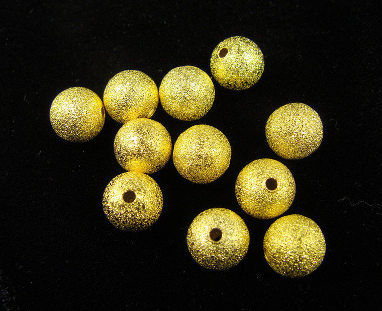 6mm Pack Of 50 Gold Stardust Round Beads