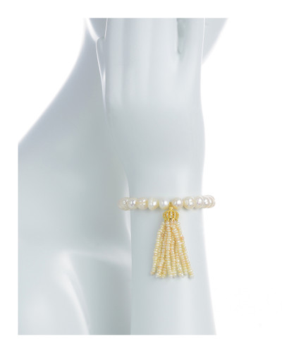 Little Gold Crown - Pearl Bracelet on model: Single strand beaded pearl bracelet with white freshwater pearls 9-10mm,1.5” seed pearl tassel drop suspended from mixed metal gold crown, on elastic, one size Little Gold Crown - Pearl Bracelet on model: Single strand beaded pearl bracelet with white freshwater pearls 9-10mm,1.5” seed pearl tassel drop suspended from mixed metal gold crown, on elastic, one size