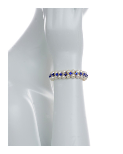 on model, Monaco Pearl Bracelet: Double strand white freshwater pearls 7-8mm, separated by stainless steel and royal blue colored CZ spacers on elastic, one size. on model, Monaco Pearl Bracelet: Double strand white freshwater pearls 7-8mm, separated by stainless steel and royal blue colored CZ spacers on elastic, one size.