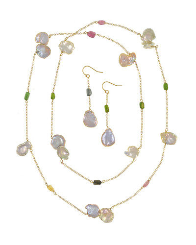 Rainbow Row - Keshi Pearl & Tourmaline Gemstone necklace and matching Keshi pearl and tourmaline earrings shown together. Keshi pearls matching necklace and earring set , Necklace is 34” in length (lariat length), 9K fine gold chain featuring 13 pale golden-pink and white keshi pearls, 12 - 15 mm, interspersed with delicately colored tourmaline baguettes in pink, green, and gold, necklace can be shortened to a choker length necklace with included converter, including  Matching shepherds hook drop Earrings are 9K fine chain gold drop earrings with 1 golden pink keshi pearl, 16 mm, and 1 green tourmaline Rainbow Row - Keshi Pearl & Tourmaline Gemstone necklace and matching Keshi pearl and tourmaline earrings shown together. Keshi pearls matching necklace and earring set , Necklace is 34” in length (lariat length), 9K fine gold chain featuring 13 pale golden-pink and white keshi pearls, 12 - 15 mm, interspersed with delicately colored tourmaline baguettes in pink, green, and gold, necklace can be shortened to a choker length necklace with included converter, including  Matching shepherds hook drop Earrings are 9K fine chain gold drop earrings with 1 golden pink keshi pearl, 16 mm, and 1 green tourmaline
