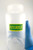Lab technician holding bottle with solvent inside and a "Sterile" caution label adhered to the container, indicating status of the lab sample