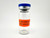 Sample in glass bottle with CAUTION NON-STERILE label indicating status