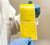 Lab technician unrolling SAMPLE Material Label roll