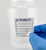 Lab technician applying QC STABILITY Material Label to bottle with solvent inside