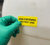 Non Conforming Label being applied to container