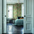 Galerie 33001 - Apelviken Anemone Floral Vines Green/orange Galerie Wallpaper - shown in room setting