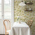 Galerie S65111 - Sommarang Retro Poppy Gold Galerie Wallpaper - shown in room setting