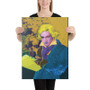 Large vertical Beethoven pop art canvas held by blonde woman in black top against light studio wall.