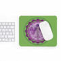 Top-down green Vitruvian Angel Purple Green mousepad on desk beside keyboard and white mouse.