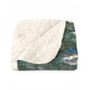 Folded Velázquez Count-Duke Olivares Horse sherpa blanket showing cream fleece and green print.