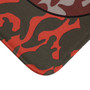 Close-up of Da Vinci Orange Pink Gray Vitruvian Space Man bath mat red-charcoal plush texture.