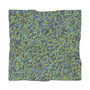 Abstract Blue in Green poly scarf flat lay with neon green and electric blue wavy lines on charcoal.