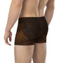 Rear three-quarter Da Vinci boxers in distressed brown wood and rust textured print.