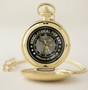 Gold pocket watch with Leonardo da Vinci Vitruvian Man dial artwork