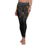 Front model in Greek Classical Art black leggings: orange oval athlete silhouettes on both thighs.