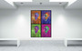 Four-panel Shadow self-portrait artwork in orange, purple, magenta and green, centered above a white console on a bright wall.