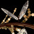 Volare 100158-8 close-up showing crystal butterfly details in Brushed Bronze