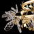 Volare 100158-7 close-up showing crystal butterfly details in Burnished Gold
