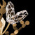 Volare 100159-7 close-up showing crystal butterfly details in Burnished Gold