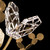 Volare 100160-7 close-up showing crystal butterfly details in Burnished Gold
