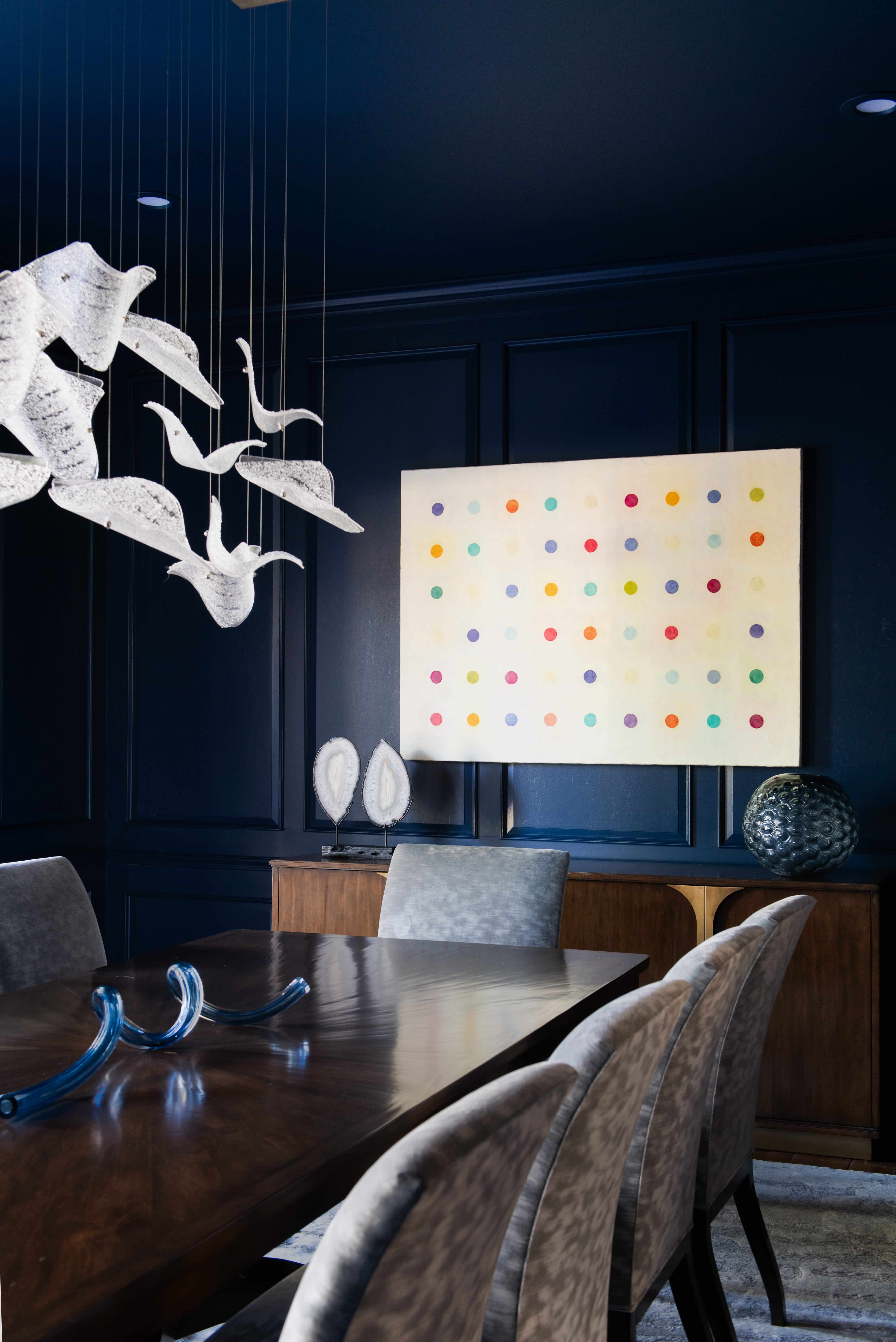 American-crafted chandelier lighting with hand-blown glass, accenting a modern luxury home with sophisticated design and refined ambiance. Handcrafted in the USA, this sculptural studio glass lighting design enhances a modern luxury residence with clean lines and curated finishes.