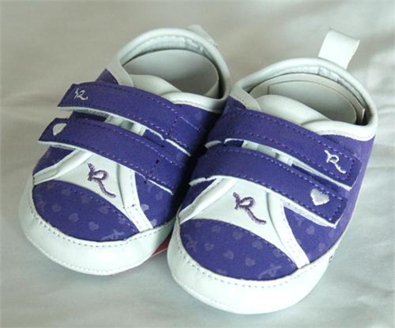 purple baby shoes