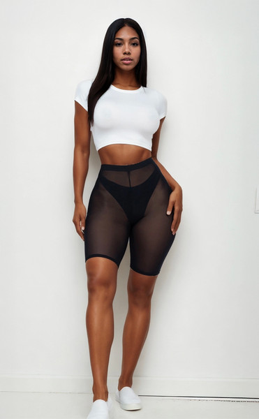 Mesh biker shorts matched with a cropped white baby tee – urban summer outfit idea