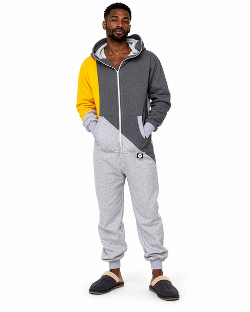 Man wearing a men’s 100% cotton hooded onesie with full zipper, tri-color block design and front pockets hiphopcloset