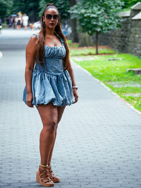 Plus Size Bubble Belle acid wash denim mini dress with trendy bubble hem