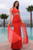 Red Wing Beaded strappy waist Gown with waist cutout and X back 