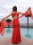 Red Flowy wing gown with x back and beaded waist by Atina Collection