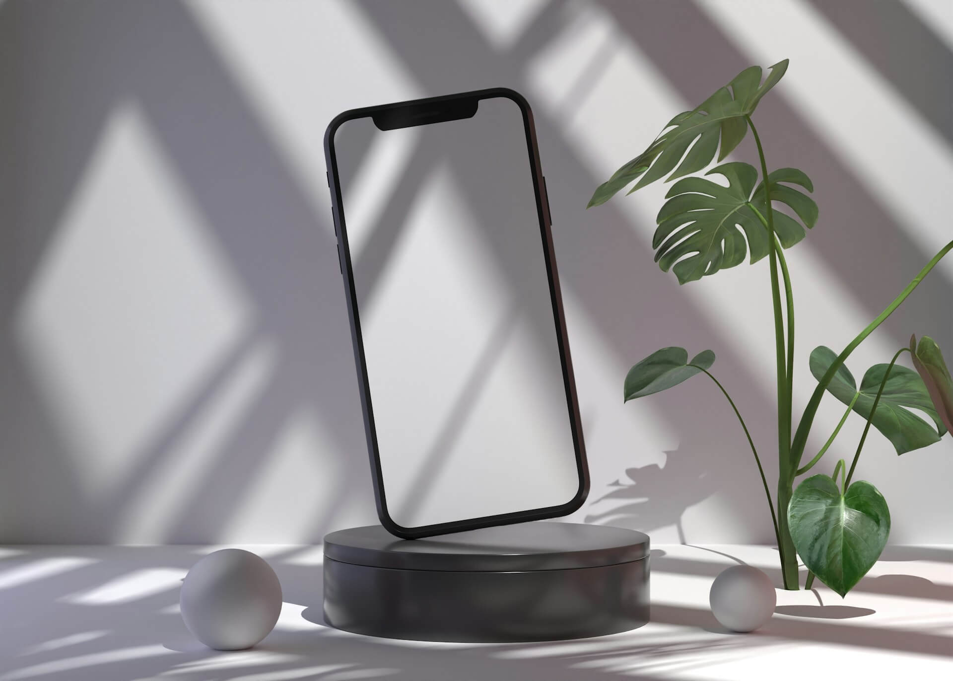 a transparent phone on a pedestal next to a plant