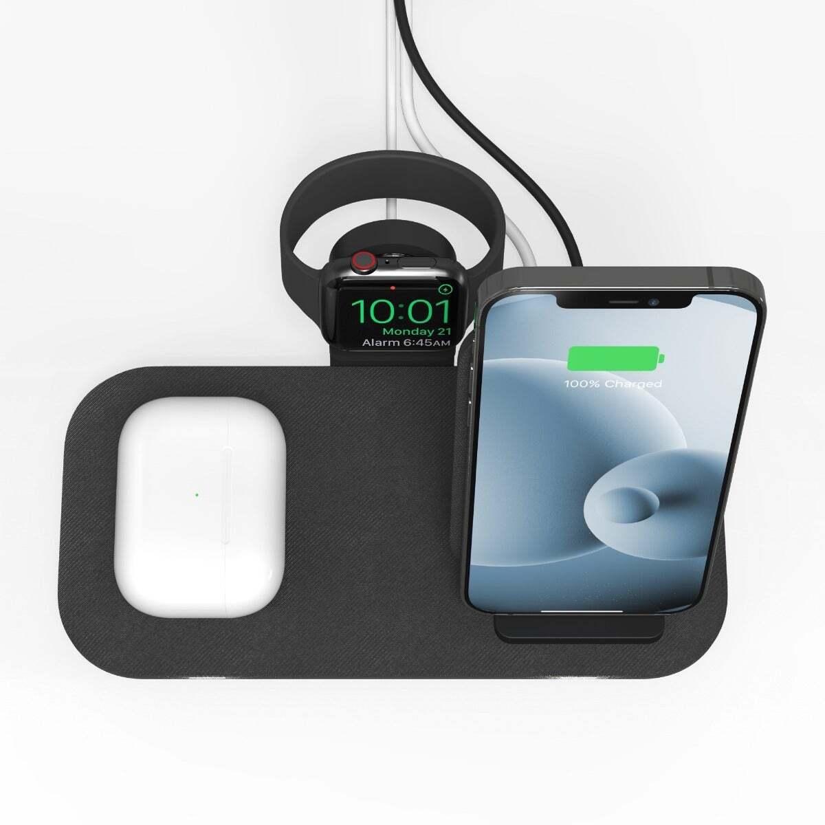 AirPods, iPhone, and an Apple Watch on a charging stand