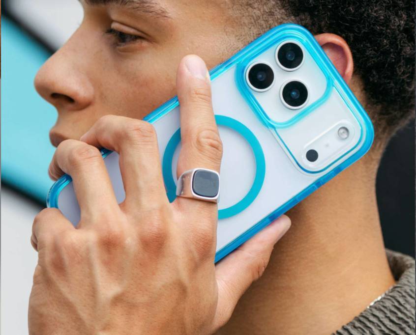 man holding a clear blue iphone case