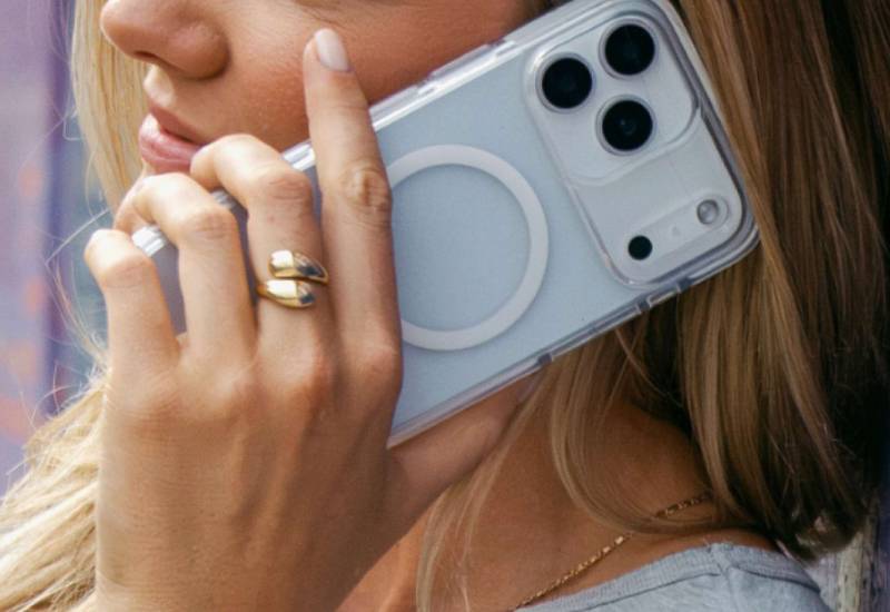 woman holding a crystal palace snap iphone case