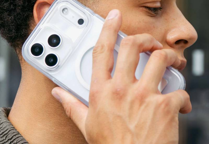man holding crystal palace snap stand case