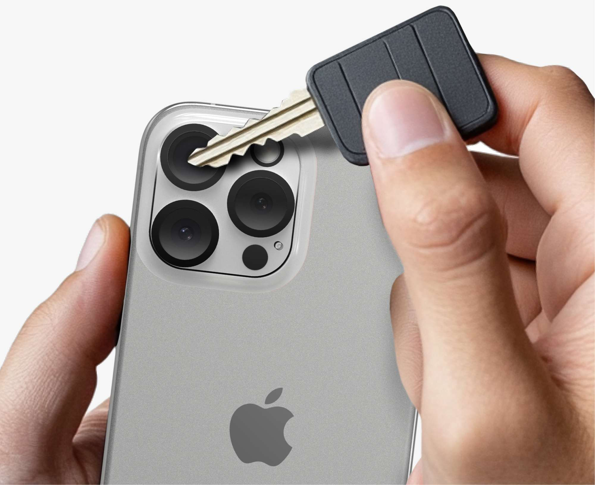 Key scratching the lens of an iPhone 16 Pro