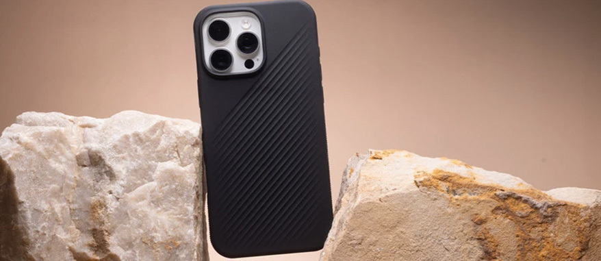 Phone in a case wedged between two rocks